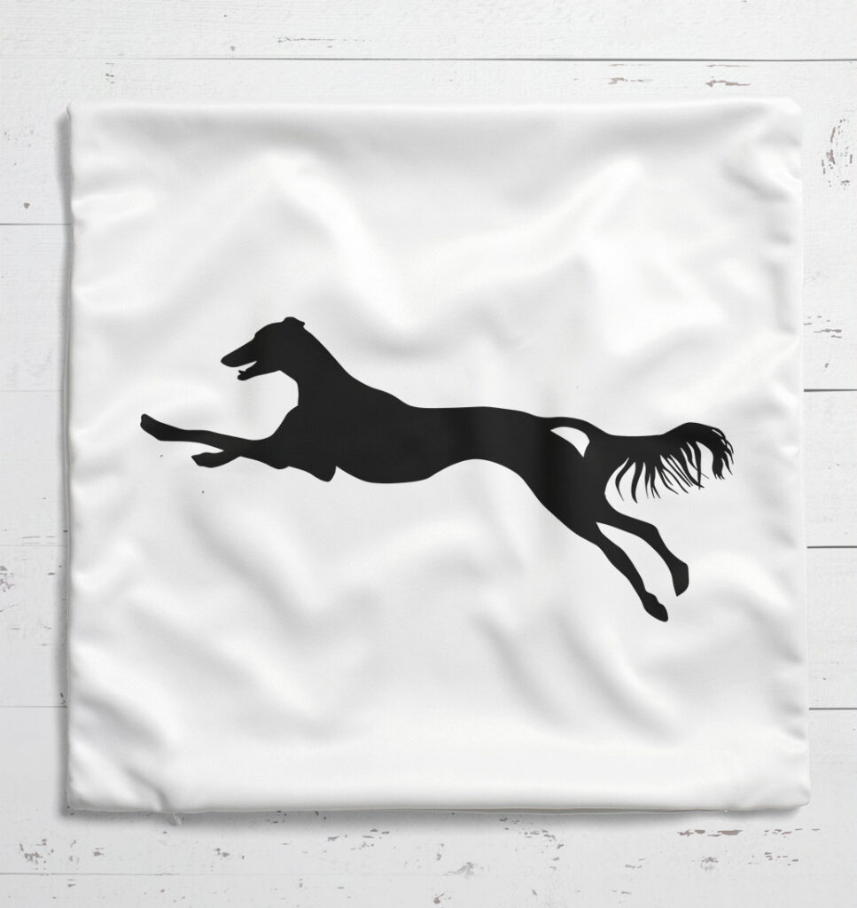 weisses Kissen mit rennenden Saluki